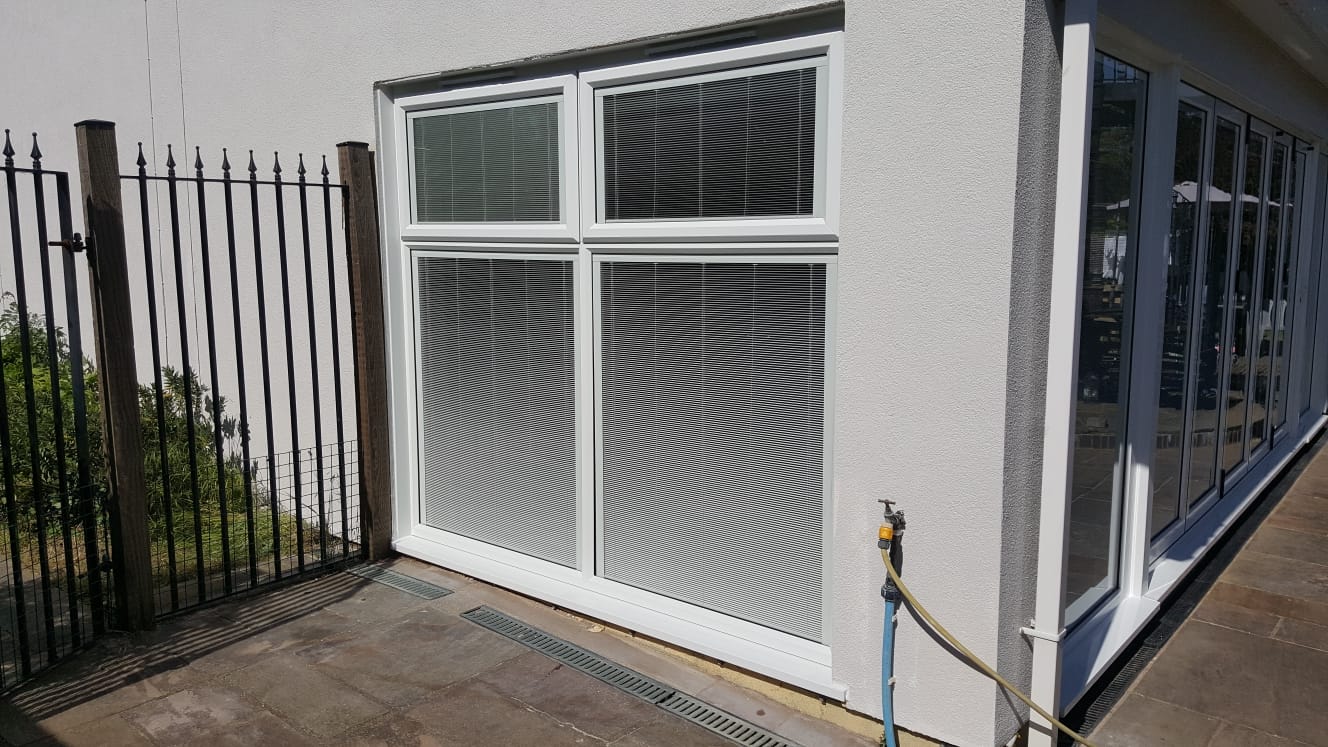 New Aluk Bi Folding Doors In Hastings Newlite