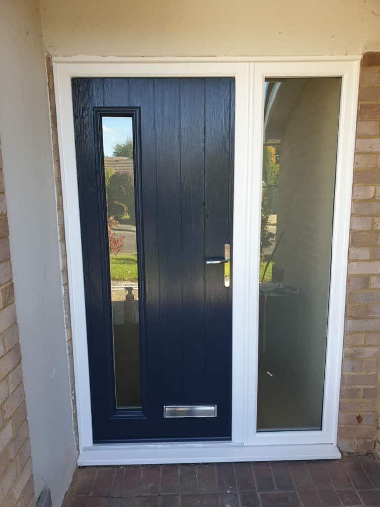 new composite front door in a grey colour with side panel