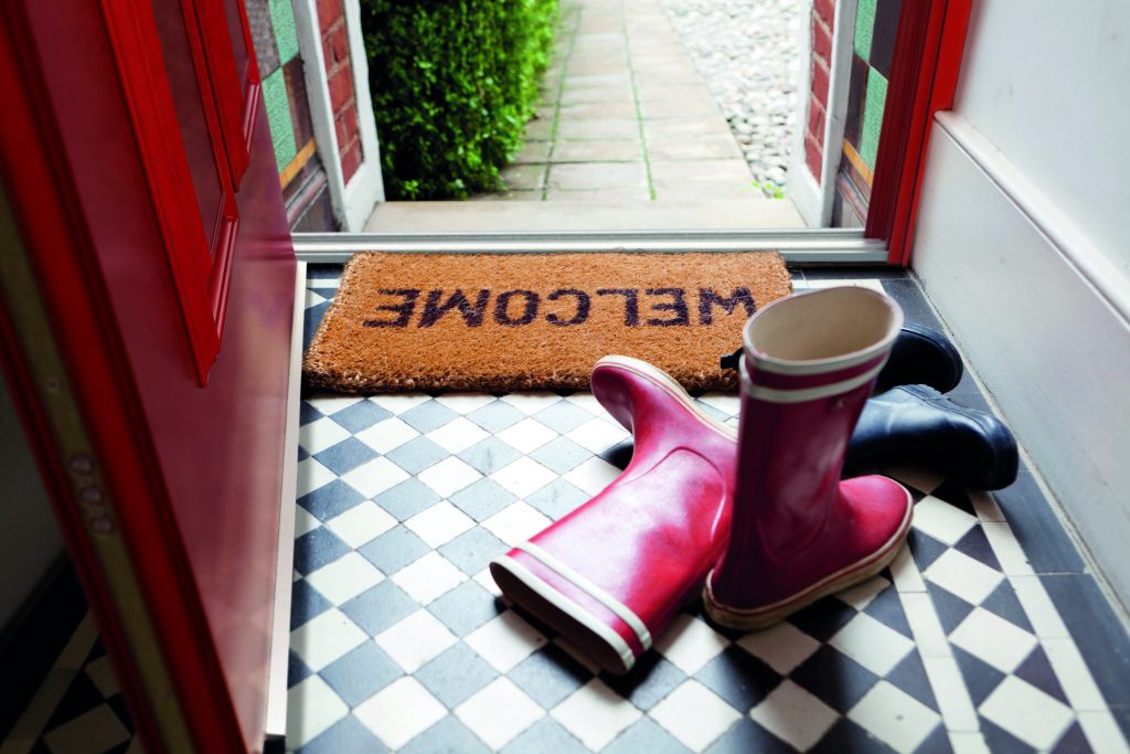 Smart Systems Designer front door with Welcome mat and wellington boots