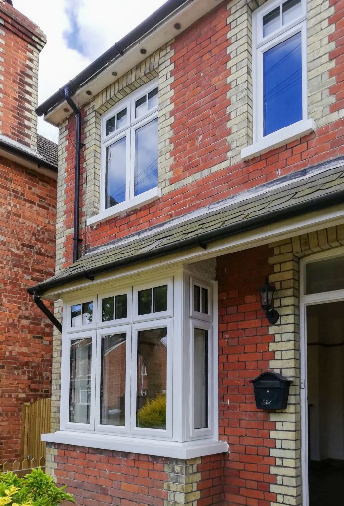 liniar slimline uPVC windows at thr front of a semi-detached house
