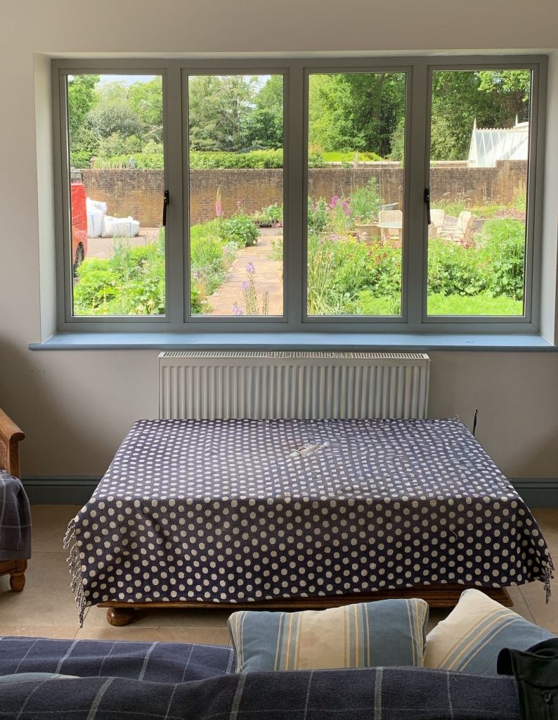 four panel window with garden views