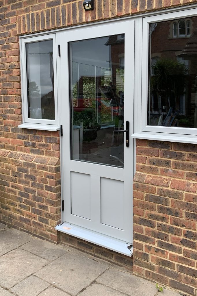 residential door with flag windows and matching cill