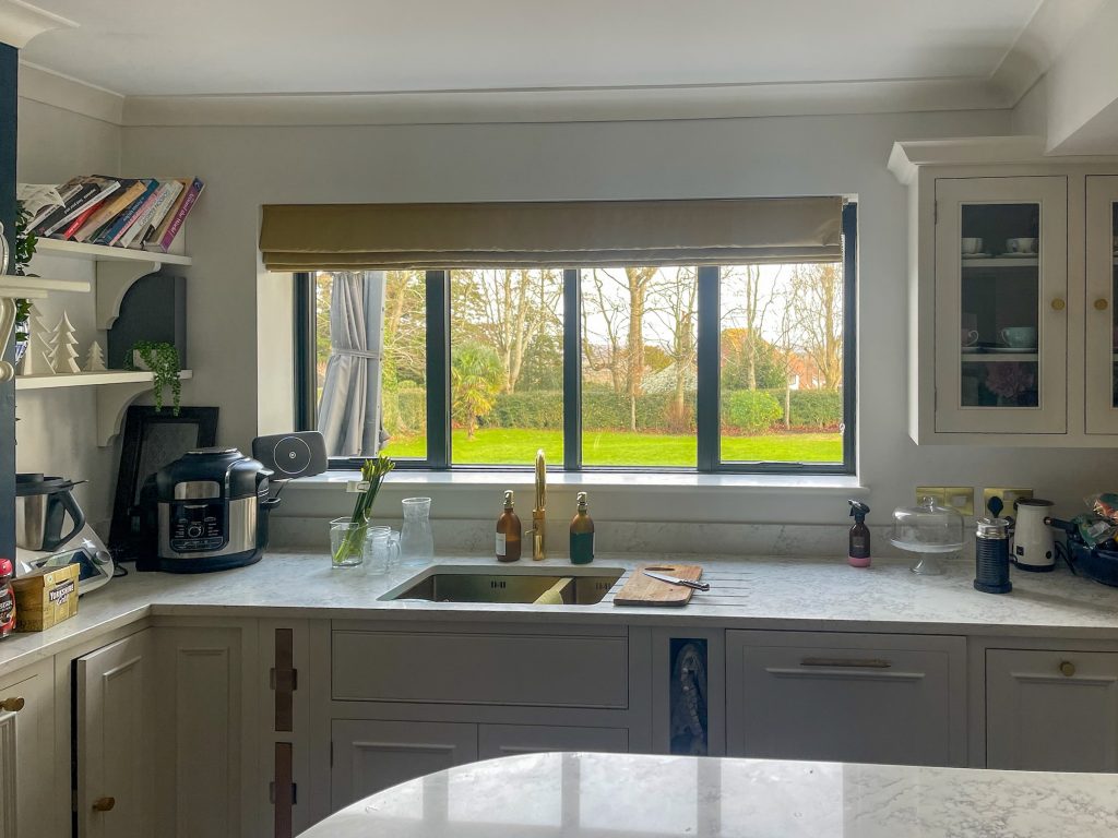 inside view of slimline windows above a kitchen sink with granite worktop