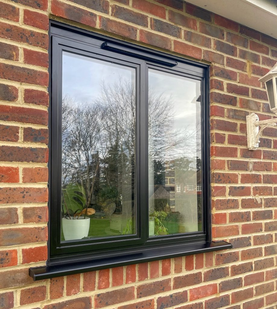 Outiside view of two panel steel look window no bars