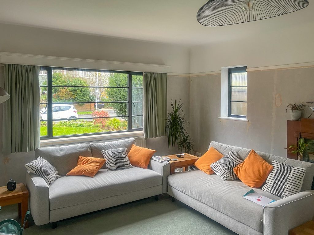 living room with two steel look and heritage windows