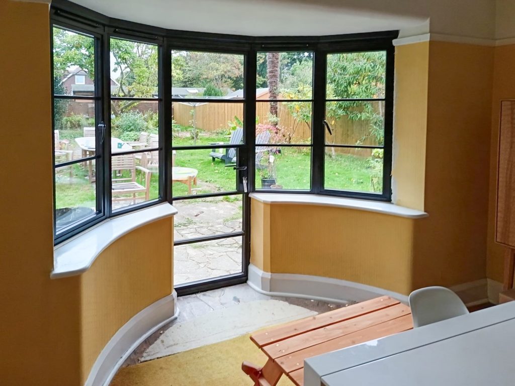 inside view of french doors with bay windows